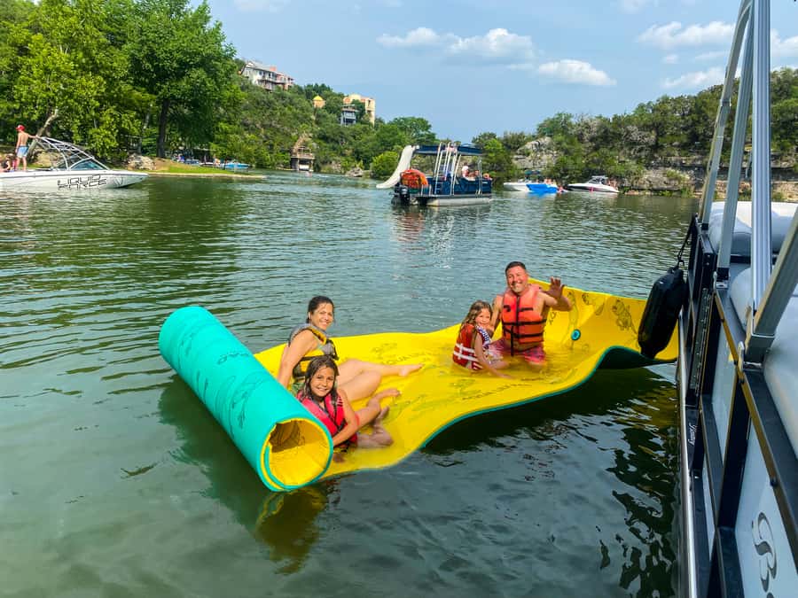 Austin: Lake Austin Private Boat Cruise - Full Sun Shading - Aqua Lily Pad time: a simple swim break that fits groups
