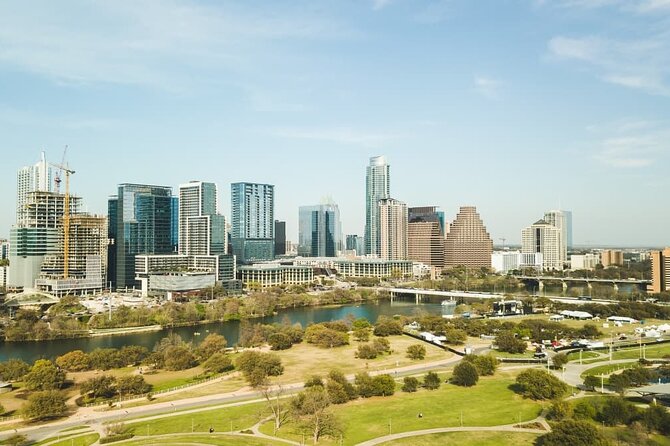 Austin Premium Driving Night Tour with Sunset Boat Cruise - Old neighborhoods, lake views, and the Tom Miller Dam explanation