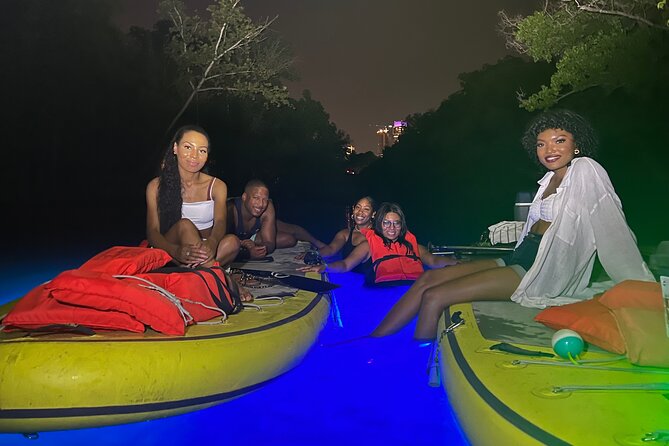 Giant Glow Paddleboarding the Downtown Skyline with Bats - Why this glow paddleboarding works so well in Austin